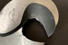 Close up on the damage to the cutter after using on thick metal cable