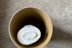 The roll of bags inside the card insert