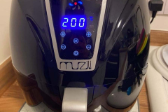 View of the Hosome Family Digital Air Fryer from the front while it is in use