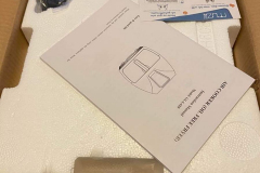 Inside the outer box showing the instruction manual