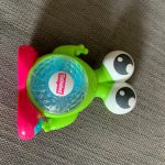 Tomy Toomie Spin & Lights Alien Close up of toy lay down