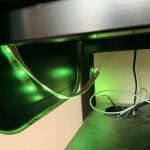 Led Strips Lights in the dark coming off the lower side of the desk