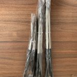 Stainless steel food tongs In plastic packaging