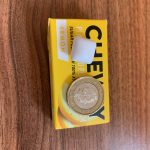 Top down size comparison of the gum and a one pound coin