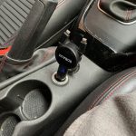 SDBAUX Car Charger in a car from a distance