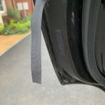 The velcro connection to hold on the side window shades