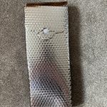The windshield shade all folded up