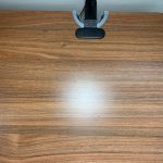 The output of the lamp on the desk below it