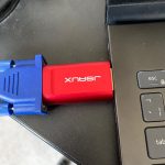 Using the adapter to connect a VGA cable to a windows laptop
