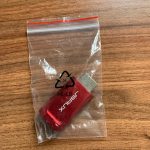 The adaptor in the little bag it came in