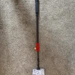 The tool set on the shortest length next to a one pound coin for scale